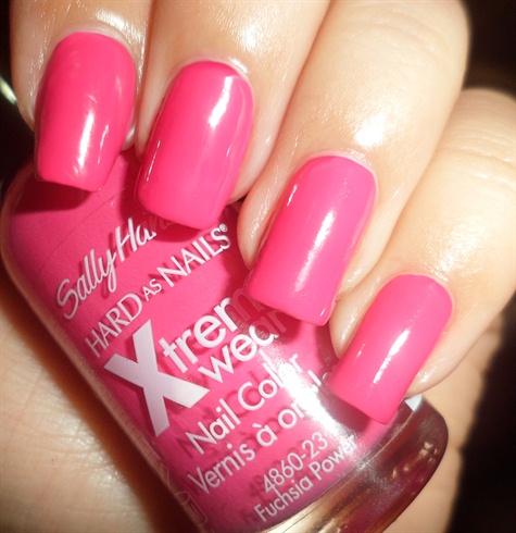 Apply base coat to protect your natural nails then paint your nails fuchsia.