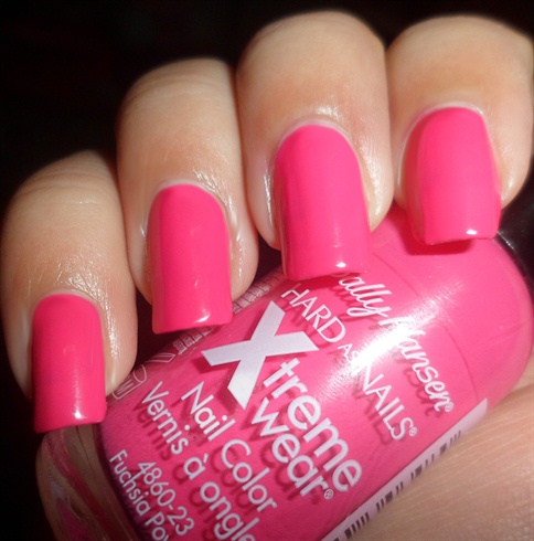Apply base coat then paint your nails fuchsia