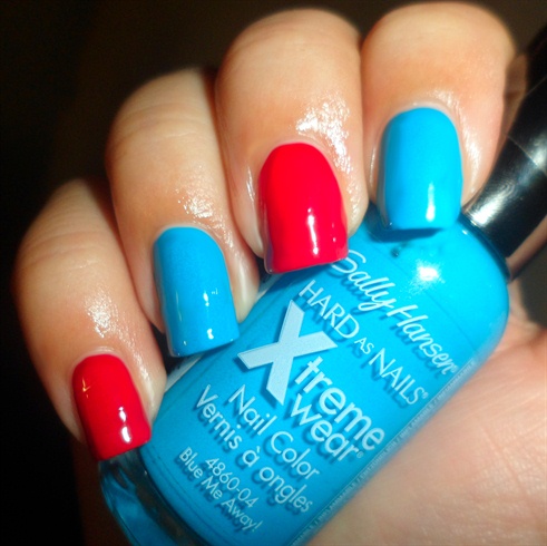 Apply base coat then paint your nails light blue and red