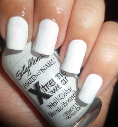 Apply base coat then paint your nails white