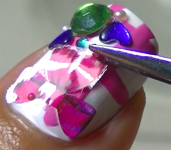 As long as the water decal has water, it will slide and you can freely position it on your nails