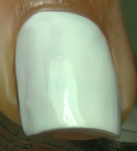 Apply base coat to protect your natural nails then paint them white