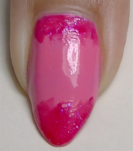 Apply pink glitter nail polish as shown