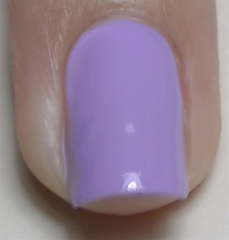 Apply base coat to prevent your nails from staining then paint your nails lilac