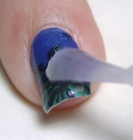 Secure and protect the nail stickers with a nice top coat