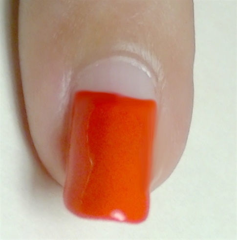 Apply base coat then paint your nails with a hot pink, red or orange nail polish, leave some space by the cuticles