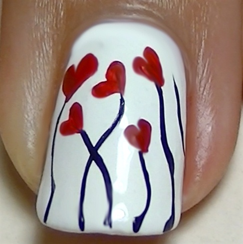 With red acrylic paint, create beautiful hearts