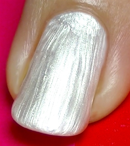 Apply base coat then paint your nails with a platinum pearl nail polish