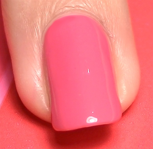 Start off with the base coat then paint your index and accent nails fuchsia
