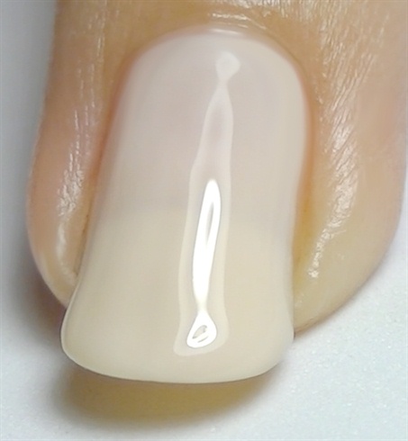 Start off with the base coat then paint your nails with a light bone color