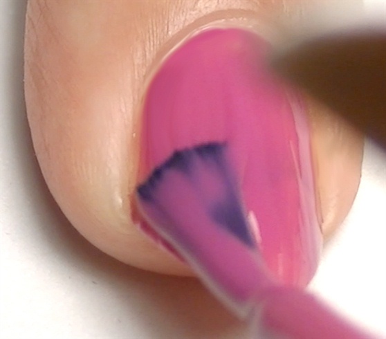 Apply base coat to prevent your nails from staining then paint your nails with a radiant orchid color