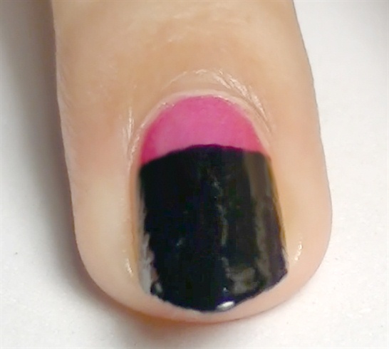 Paint your nails black except for the half moon