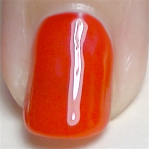 Apply your favorite base coat to protect your natural nails, I'm using nail envy by OPI then paint your nails with a red nail polish, I'm using Sally Hansen Pucker Up