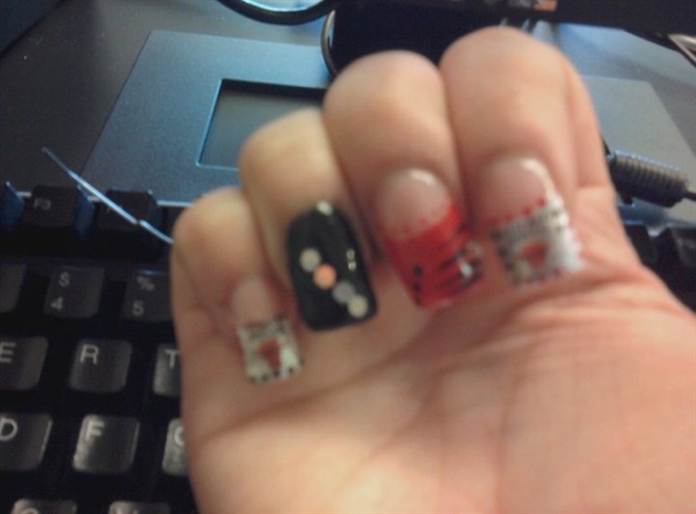 these are my chicago bulls nails made from watermark decals. In gel