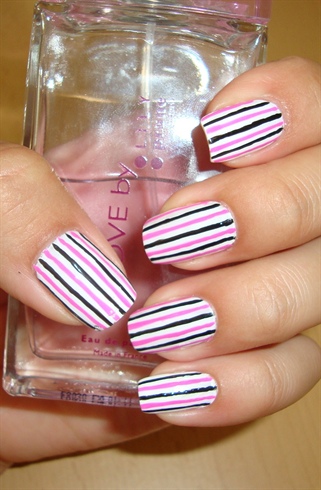White nails with pink and black stripes