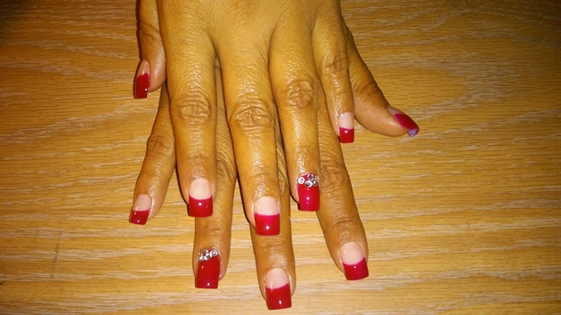 red nails with little bling 