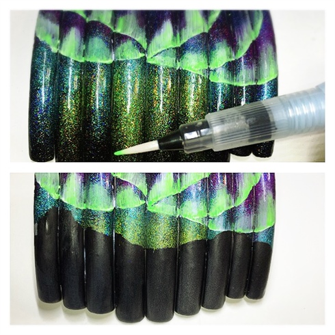 1. Using a water brush (Wildflowers) float green acrylic paint over top of white northern lights. Several coats are needed, allowing to dry between layers.  2. Add mountain range with black acrylic paint.