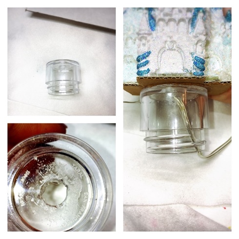 Prepare an empty glitter jar by drilling a hole in the center. This will hold the battery pack for your light as well as serve as a riser for your castle.