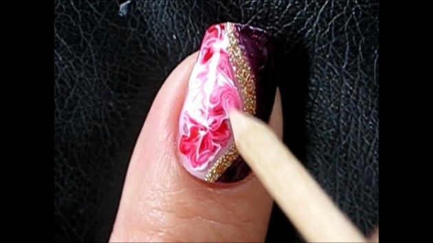 swirl the colors together to achieve the marble look