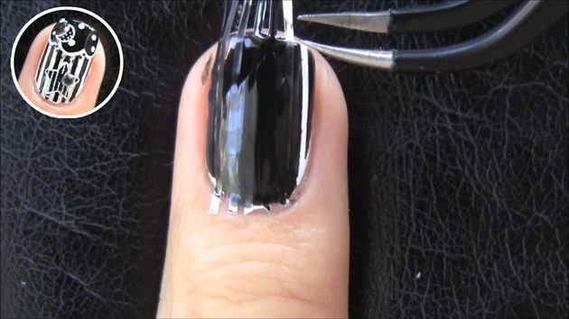 apply black polish over entire nail and peel off tape one by one