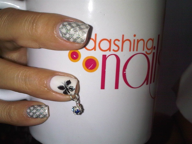 butterfly with silver fishnet nail art
