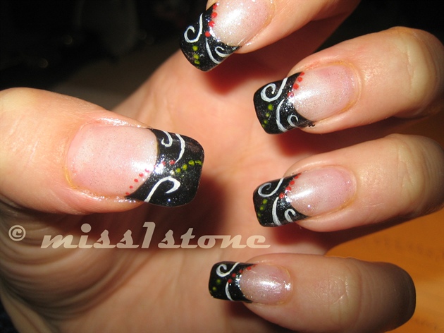 black design with dots and swirls