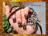 Gold and Black Red Carpet Nails