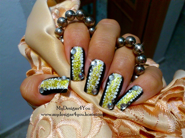 Gold and silver abstract nail design