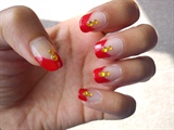Red french tip with golden rhein stones