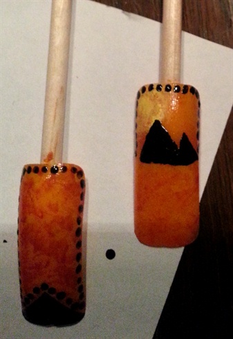 Using my dotting tool I 'framed' the nail ..and added some pyramids on the 'camel' nail.