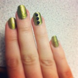 Gold and Black Studded Nail Art Design