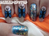 Glitzy butterfly nails !