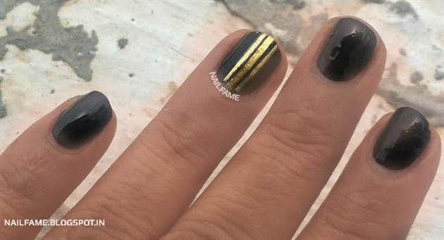 BLACK AND GOLD NAILS