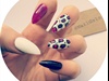white purple black animal print nails