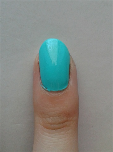 Paint your nails in Barry M's Gelly Hi Shine in Greenberry. 