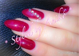 Metallic-Red-Almond Nails with Strass