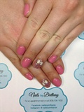 Pink gel polish with bows