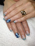 Light blue french and snowflake accent