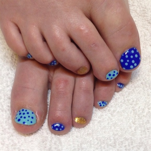 Shades of blue polka dots, gold accent