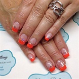 Neon orange french with silver glitter