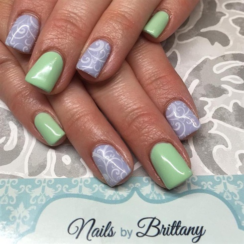 Pastel nails with stamped designs