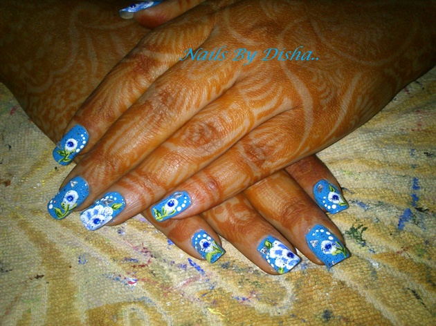 one stroke flowers on blue nails