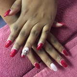Manicure in Red with Rudolph accent nail