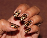 Golden leopard nails