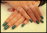 Green nails with cross design