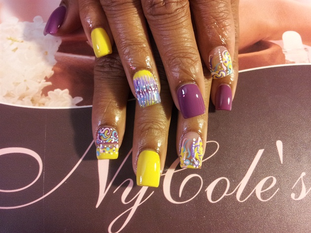 purple and yellow nail art