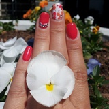 red nails with flower