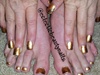 Gold and black nails