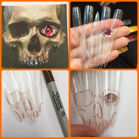 Once I had settled on the layout of my piece I attached my tips together using nail glue. I found an image of a skull online to use as a reference and after scaling it to size I printed it out so that I could trace the important details onto my tips using a plain old sharpie!