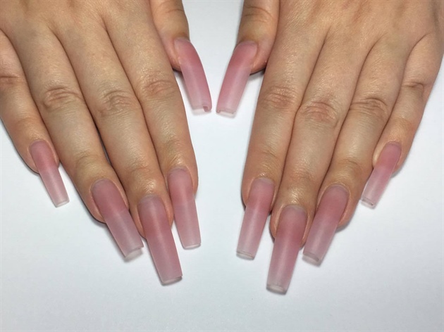I began by prepping the nails for acrylic application and extended my models nails using cover pink acrylic.